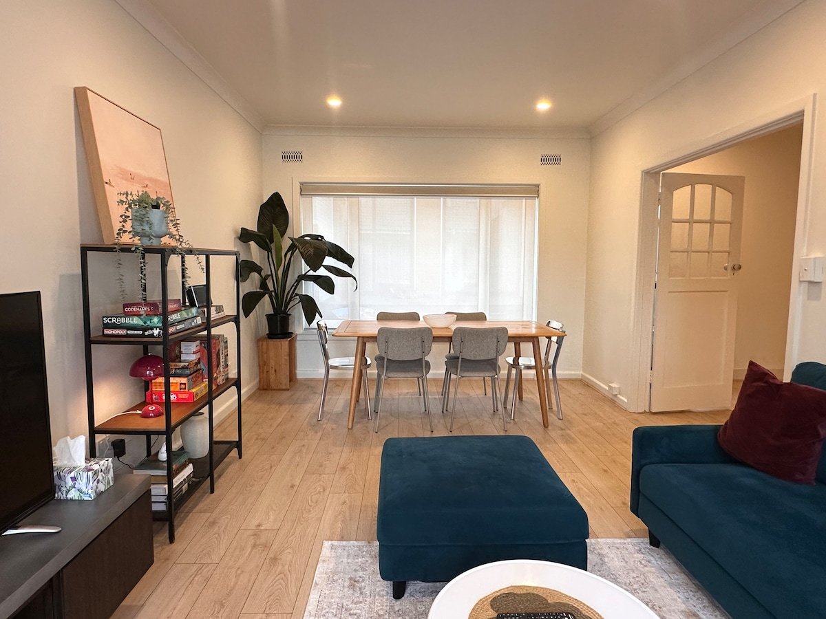 Open-plan living and dining area in a furnished Ashburton, Melbourne home